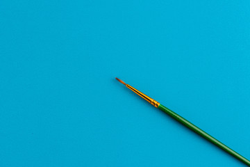Paintbrush Isolated On Blue Background
