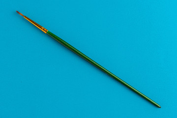Paintbrush Isolated On Blue Background
