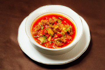 Lamb lagman in a white plate