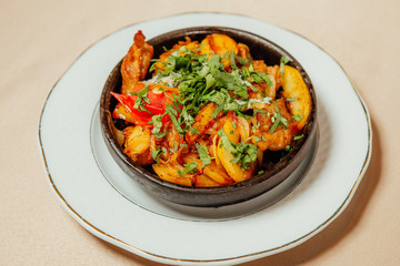 Ojakhuri on a white plate