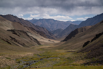 Fototapeta premium Trekking from Pshart valley through Gumbezkul pass to Madiyan in Tajikistan Pamir highway