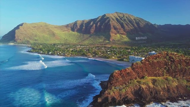 Aerial view of the west coast of the island of Oahu during sunrise