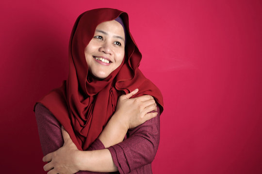 Muslim Woman Hug Her Self