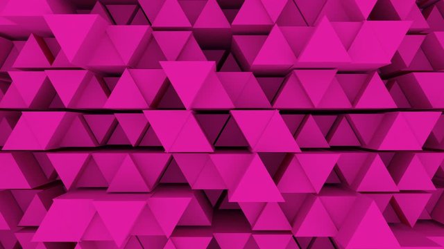 Abstract 3d geometric triangle shapes moving like waves. Colored triangle animation. Seamless loop 4k.