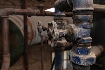 detail of gas tap in an abandoned factory