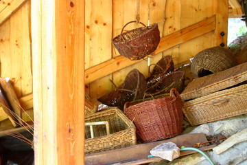 Obraz na płótnie Canvas Wicker baskets in a wooden barn