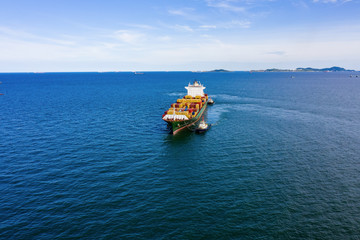 industry business logistics cargo containers ship by the sea camera from drone aerial view