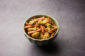 Carrots, cauliflowers achar made using PhoolGobi and Gajar. It's a sweet and sore seasonal pickle from India