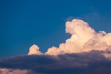 White cloud on a blue sky during sunset
