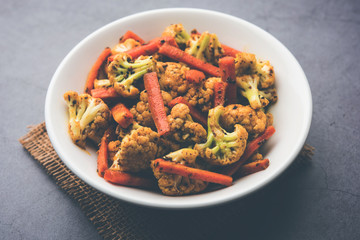 Carrots, cauliflowers achar made using PhoolGobi and Gajar. It's a sweet and sore seasonal pickle from India