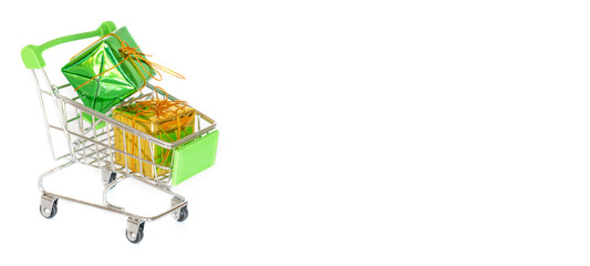 Cart of small Christmas gift boxes on white background, shopping selling market in holiday season concept