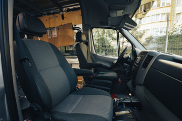 Minivan interior being repaired at an auto shop