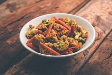 Carrots, cauliflowers achar made using PhoolGobi and Gajar. It's a sweet and sore seasonal pickle from India