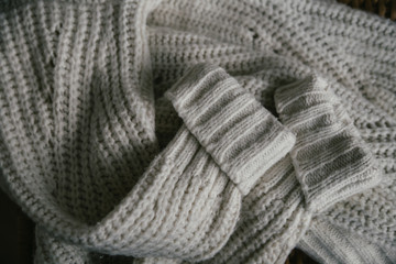 white sweater with sleeves close-up