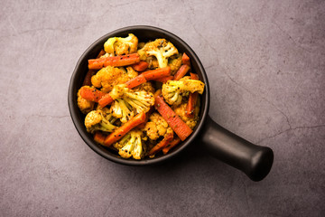 Carrots, cauliflowers achar made using PhoolGobi and Gajar. It's a sweet and sore seasonal pickle from India