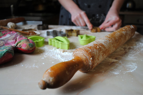 The process of making ginger cookies. Girl is preparing cookies. Gluten free from rice flour. Housewife makes christmas cookies. Close up close shot