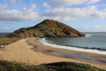 Escena de playa norte de Menorca