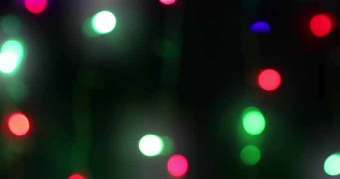 4k background of flickering blurred garlands