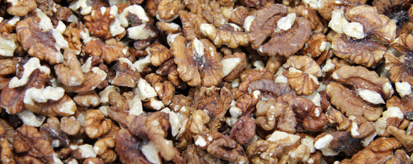 Peeled walnuts full frame photo. Walnuts pattern. Kernels.