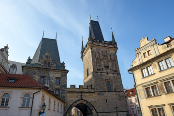 Fototapeta na wymiar Close-up western towers of Charles Bridge in Prague, Czech Republic.