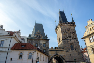Fototapeta premium Close-up western towers of Charles Bridge in Prague, Czech Republic.