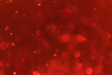 Ruby red bokeh background with soft blur bokeh light effect, background bokeh