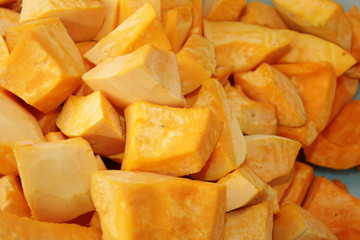 Raw pumpkin slices. Fresh sliced raw pumpkin for dessert.