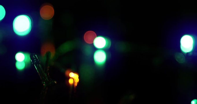 4k background of flickering blurred garlands