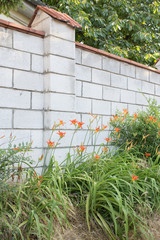 White limestone fence.