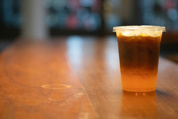 Iced fresh orange juice topped with espresso