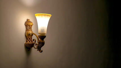Old fashioned lamp at night. Brightly lit street lamps at sunset. Decorative lamps. Copy space