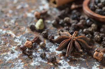 Spices and herbs. Food and cuisine ingredients. Cinnamon sticks, anise stars, black peppercorns and...