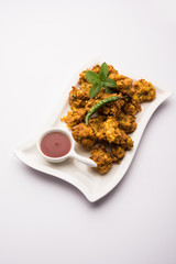 Crispy Corn pakora/pakoda, bhajji, Bhaji, bajji or pattice . served with tomato ketchup