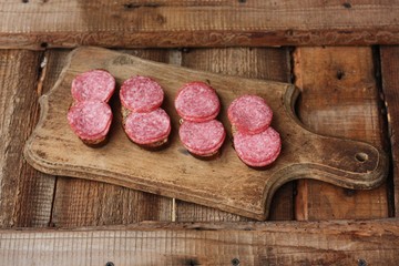Sandwiches with bread and sausage on the table 