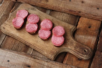 Sandwiches with bread and sausage on the table 