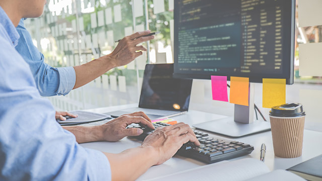 Programmer working in a software development and coding technologies. Website design. Technology concept.