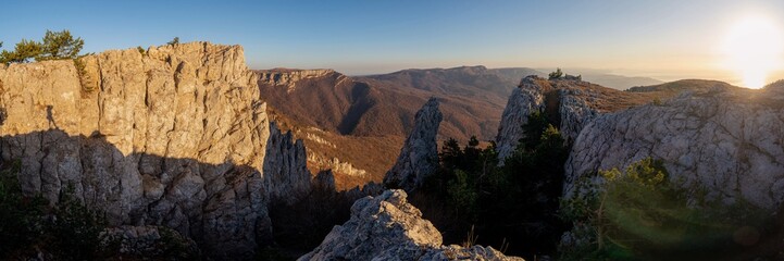 Fototapeta na wymiar Rocky mountain range at sunrise, panorama