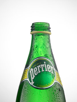 perrier green glass bottle on the white background
