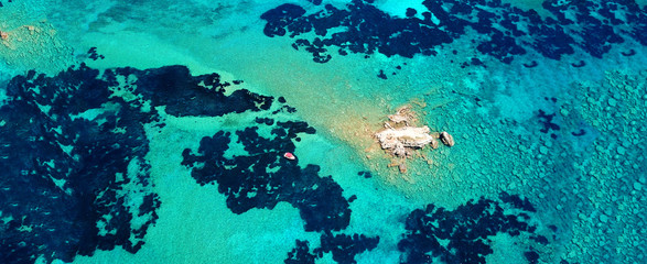 Fototapeta na wymiar Aerial drone ultra wide photo of secluded turquoise exotic paradise bay with sandy beach