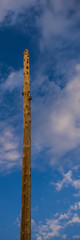 Old Wooden Pole Electricity Networks on Blue Sky Background