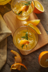 Navel orange cocktail with rosemary..