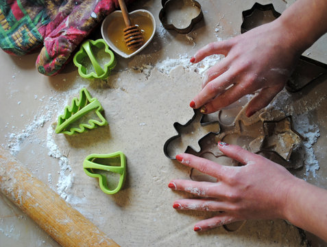 The process of making ginger cookies. Girl is preparing cookies. Gluten free from rice flour. Housewife makes christmas cookies. Close up close shot
