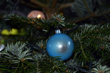 Fototapeta na wymiar Beautiful Christmas balls on the Christmas tree