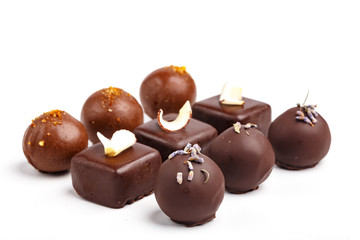 Fine handmade chocolates. Isolated on white background
