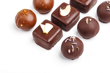 Fine handmade chocolates. Isolated on white background