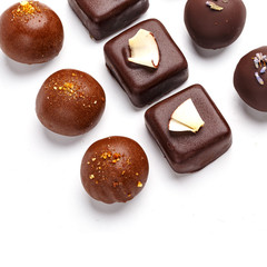 Fine handmade chocolates. Isolated on white background