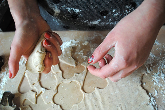 The process of making ginger cookies. Girl is preparing cookies. Gluten free from rice flour. Housewife makes christmas cookies. Close up close shot