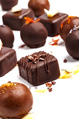 Fine handmade chocolates. Isolated on white background