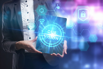 Business, Technology, Internet and network concept. Young businessman working on a virtual screen of the future and sees the inscription: Our vision