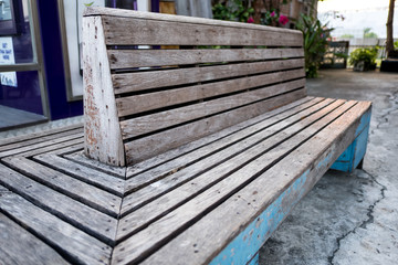 Fototapeta premium Long wood Chair bench in the city park.